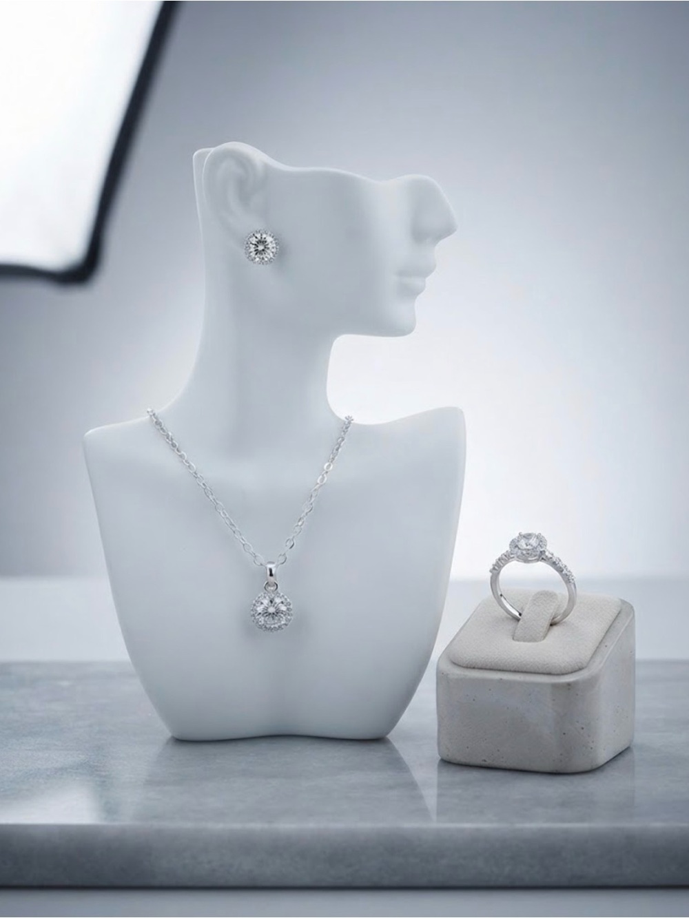 Dazzling Silver Halo Pendant Necklace with Matching Stud Earrings